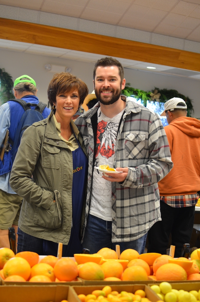 LREC Business Manager Anita Hunt and son Sean joined in the citrus sampling.