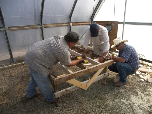 Gerry, Jose T. and Jose H. make improvements in the benches