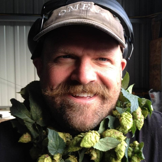 Brian Tennis, Vice Chair for the NCPN-Hops Tier 2 Committee, is a pioneer in Michigan's re-emerging hop growing industry. Tennis and partners in the Michigan Hop Alliance are focused on supplying the craft brewing industry with small acreage, high-demand cultivars.