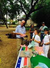 Placer County 4-H Youth share a snack with Supervisor Holmes.