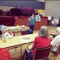 Nutrition Educator Kaili Acosta teaching the Plan Shop Save cook series at Pinedale Community Center.