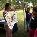 Here Pheobe asks the students to point out the dairy foods on the posters.