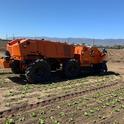 Photo 2. FarmWise Titan autonomous tractor equipped with split knives