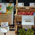 Point-of-purchase signage promotes fruits and vegetables at a small market in Tulare County