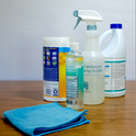Cleaning, sanitizing, and disinfectant products and microfiber towel. Photo by A. Katrina Hunter.