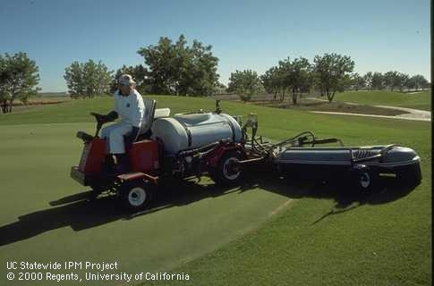 Fig 2. A covered boom sprayer application on turf. [S. Paisley]