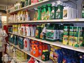 A retail shelf showing various pesticide containers. (Credit: Cheryl A. Reynolds)