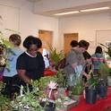 Gardeners browsing the variety of plants available. (photo by Jennifer Baumbach)