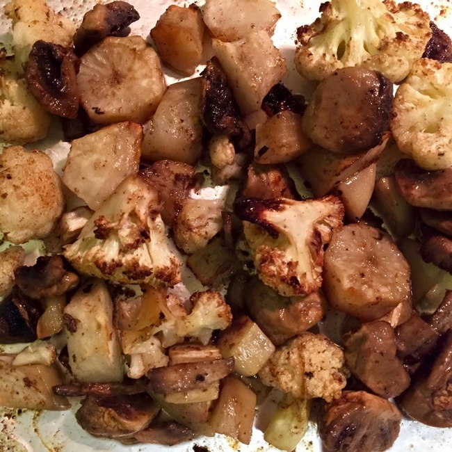 Picture of Roasted Sunchokes with cauliflower, mushrooms and garlic seasoned with garam masala, coconut oil and lime juice, courtesy of Donny Homer