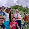 Agritourism Coordinator, Rachael Callahan, with AHSI staff and farmers, visiting a pineapple farm in Rizal.