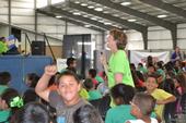 UC nutrition educator Julie Cates, center, with children at AgVenture Day.