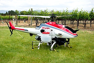 Scientists believe drones like this  helicopter sprayer may one day be used to reduce labor needs in agricultural production. (Photo: UC Davis)