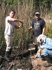 Kent Lightfoot and graduate students Liam Reidy and Chuck Striplen at the research site.