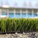 Artificial turf doesn't have the cooling effect of a living lawn. (Photo: Bitjungle)