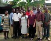 Kathryn Dewey (center with maroon shirt) with collaborators in Africa.