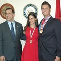 Sissy and Samuel Sugarman pose with Congressman Darrell Issa after receiving their medals.