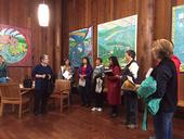 Janet Napolitano (left) and Glenda Humiston (with white sleeves) meet the staff at United Indian Health Services at Potawot Health Village. The facility serves 15,000 people in Humboldt and Del Norte counties.