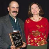 Dan Macon, with Shermain Hardesty of the Small Farm Program, receives the Pedro Ilic Award.