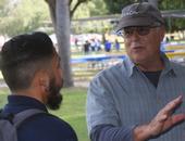 UCCE horticulture advisor Don Hodel, right, said fig trees at El Pueblo de Los Angeles Historical Monument become unhealthy when the ground beneath the canopy was covered with concrete, preventing fallen leaves from decomposing and enriching the soil.