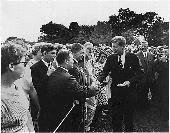 President Kennedy greets Peace Corps volunteers in 1961. (Photo: Wikimedia Commons.)