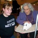 In one Siskiyou County 4-H activity, members visited residents of an assisted living facility with dogs and other animals.