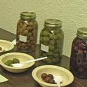 Garden writer steers readers to UCCE for olive curing advice.