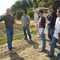 Mark Van Horn, director of the Student Farm, gives a UC Davis class a tour of the farm's market garden.