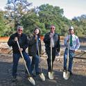 Bill Frost, Barbara Allen-Diaz, Bob Timm and 4-H member Cody break ground for the Rod Shippey Education Facility and Field Laboratory.