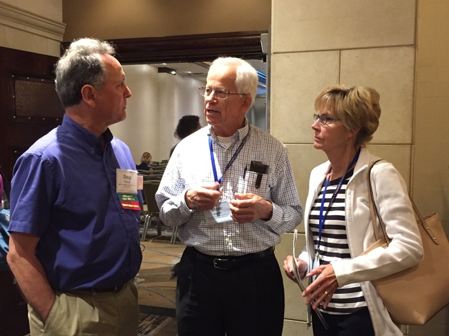 Doug Parker talks with PAC member Steve  Sinton and his wife Jane Sinton.