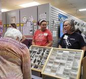 At a recent Bohart Museum open house, doctoral student Iris Quayle (left) and Professor Fran Keller of Folsom Lake College chat with a visitor. Keller, a UC Davis doctoral alumna, is a Bohart research associate and also a lecturer, UC Davis Department of Entomology and Nematology. (Photo by Kathy Keatley Garvey)