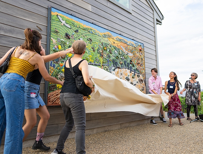 Jael Mackendorf of the UC Davis College of Agricultural and Environmental Sciences, captured the moment the mural was unveiled.