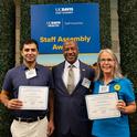 UC Davis Chancellor Gary May congratulates the California Master Beekeeper Program. With him are co-program managers Wendy Mather and Kian Nikzad. (Photo by Kathy Keatley Garvey)