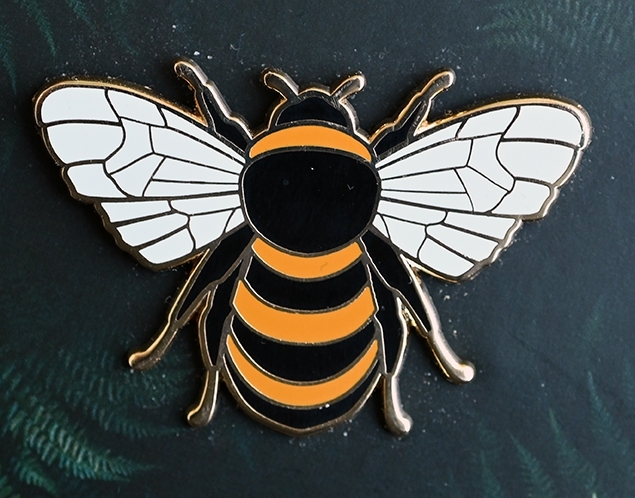 A bee pin available at the Bohart Museum gift shop. (Photo by Kathy Keatley Garvey)