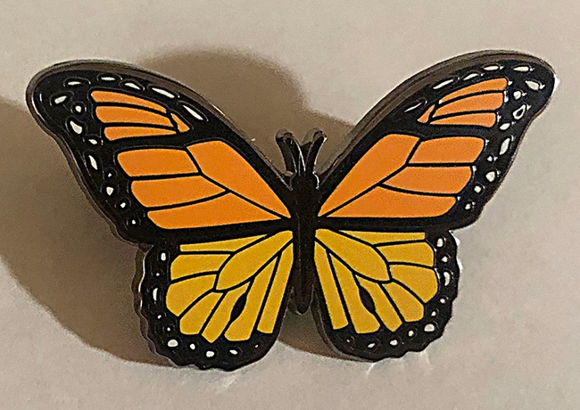 A monarch pin available at the Bohart Museum gift shop. (Photo by Kathy Keatley Garvey)