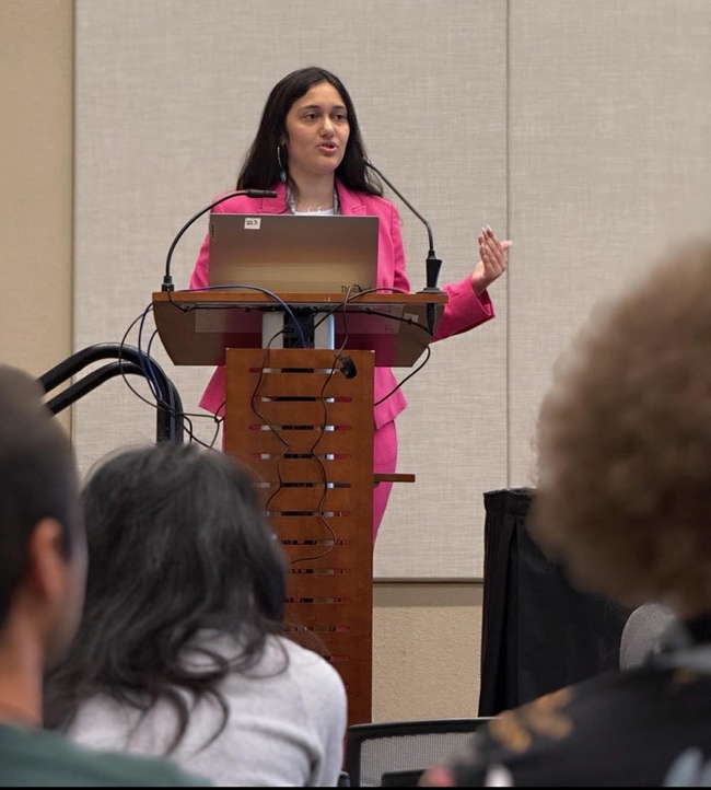 Doctoral candidate CC Edwards of the Geoffrey Attardo lab delivering her presentation on Aedes aegyptii mosquitoes. (Photo courtesy of Lexie Martin)