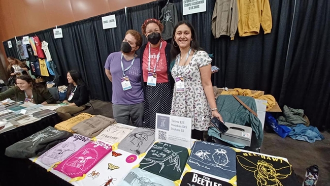 UC Davis Entomology Graduate Student Association members--Ziv Lieberman, Iris Quayle and CC Edwards--offering entomology T-shirts, all designed by members. They can be ordered online at https://ucdavisentgrad.square.site.