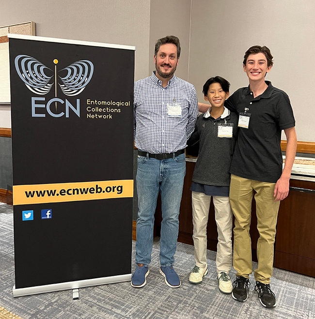 Oliver Keller, president of the Entomological Collections Network (ECN), welcomes young entomologists Connor Hsu (center) and Cole Cramer to the 2024 ECN conference, held in Nov. 9-10 in Phoenix.