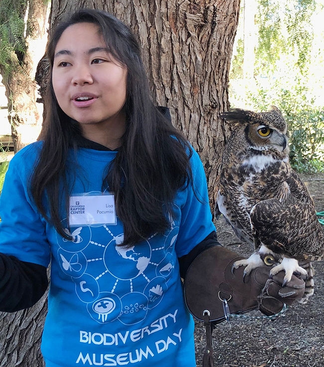 Lisa Pacumio with great-horned owl at the California Raptor Center on Old Davis Road. (Photo by Kathy Keatley Garvey)