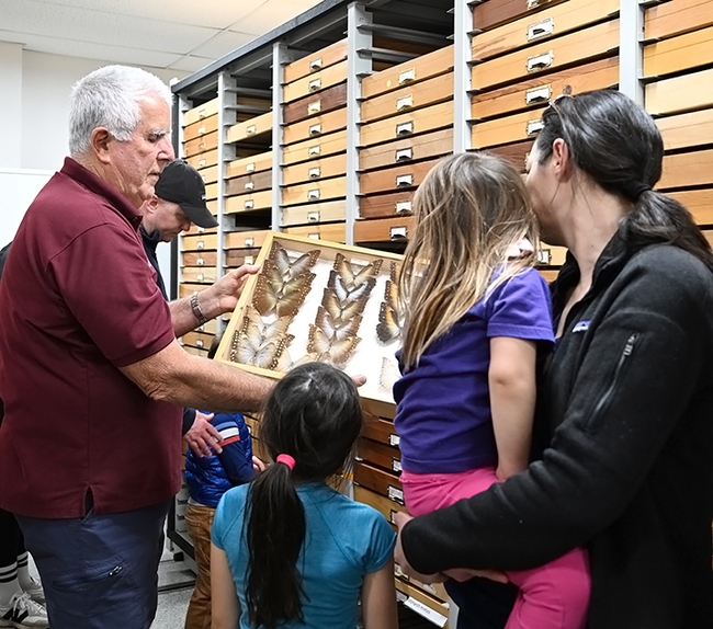 Entomologist Jeff Smith, curator of the Bohart Museum's Lepidoptera collection, talks to visitors. (Photo by Kathy Keatley Garvey)