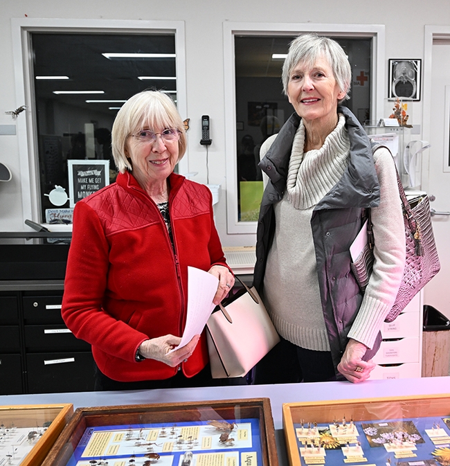 Two retired teachers from Davis, Kathleen Gamper (left) and
Joanne Andressen enjoying the Bohart Museum open house. Both are also accomplished artists. (Photo by Kathy Keatley Garvey)