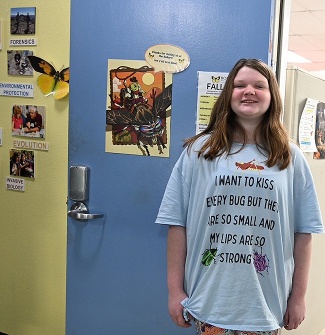 Livi Watson, 11, of Davis wearing a favorite bug shirt to the Bohart Museum open house. She enjoys insect science, but is leaning toward a career in the veterinary field. (Photo by Kathy Keatley Garvey)