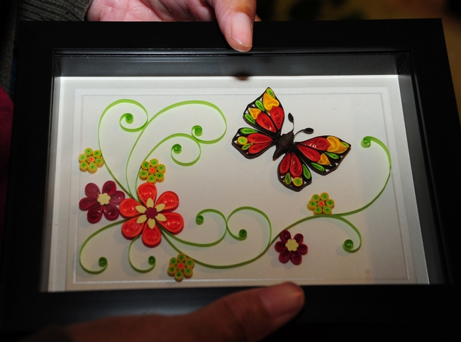 This paper art, of a butterfly and flowers, is the work of Tina Waycie of Vallejo. (Photo by Kathy Keatley Garvey)