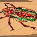 A jeweled beetle, part of the arts and crafts activity. (Photo by Kathy Keatley Garvey)