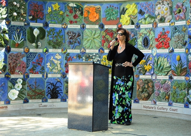 Self-described rock artist Donna Billick addresses the crowd at the opening of Nature's Gallery, UC Davis Arboretum. (Photo by Kathy Keatley Garvey)