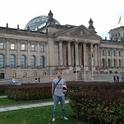 Matan Shelomi, wearing a UC Davis entomology shirt, stands in front of the Reichstag in Berlin.