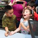 Roxanne Bell, 7, of Davis, decided that Peaches, the rose-haired tarantula, 