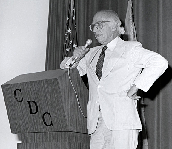 Jonas Salk (1914-1995), who discovered the polio vaccine in 1955, speaks to the Centers for Disease Control and Prevention in 1988. (CDC Photo)