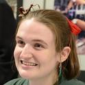 Graduate student Charlotte Herbert, who is seeking her doctorate in entomology from UC Davis, has a visitor in her hair--a stick insect barrette. (Photo by Kathy Keatley Garvey)
