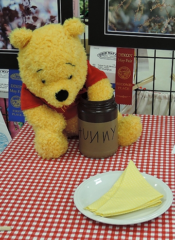 Winnie the Pooh is part of a display in the Youth Building. (Photo by Kathy Keatley Garvey)