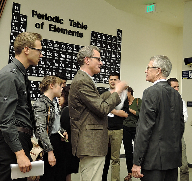 Professor Walter Leal (center right) answers questions following the symposium. (Photo by Kathy Keatley Garvey)